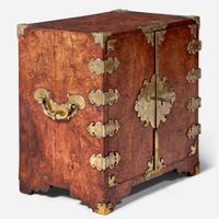 A Queen Anne brass-mounted burl yew table cabinet circa 1710