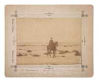 [WOUNDED KNEE]. Four photographs taken in the immediate aftermath of Wounded Knee, incl. Lt. Sydney Cloman on the battlefield surrounded by dead Lakota members of Big Foot’s Band. January 1891.