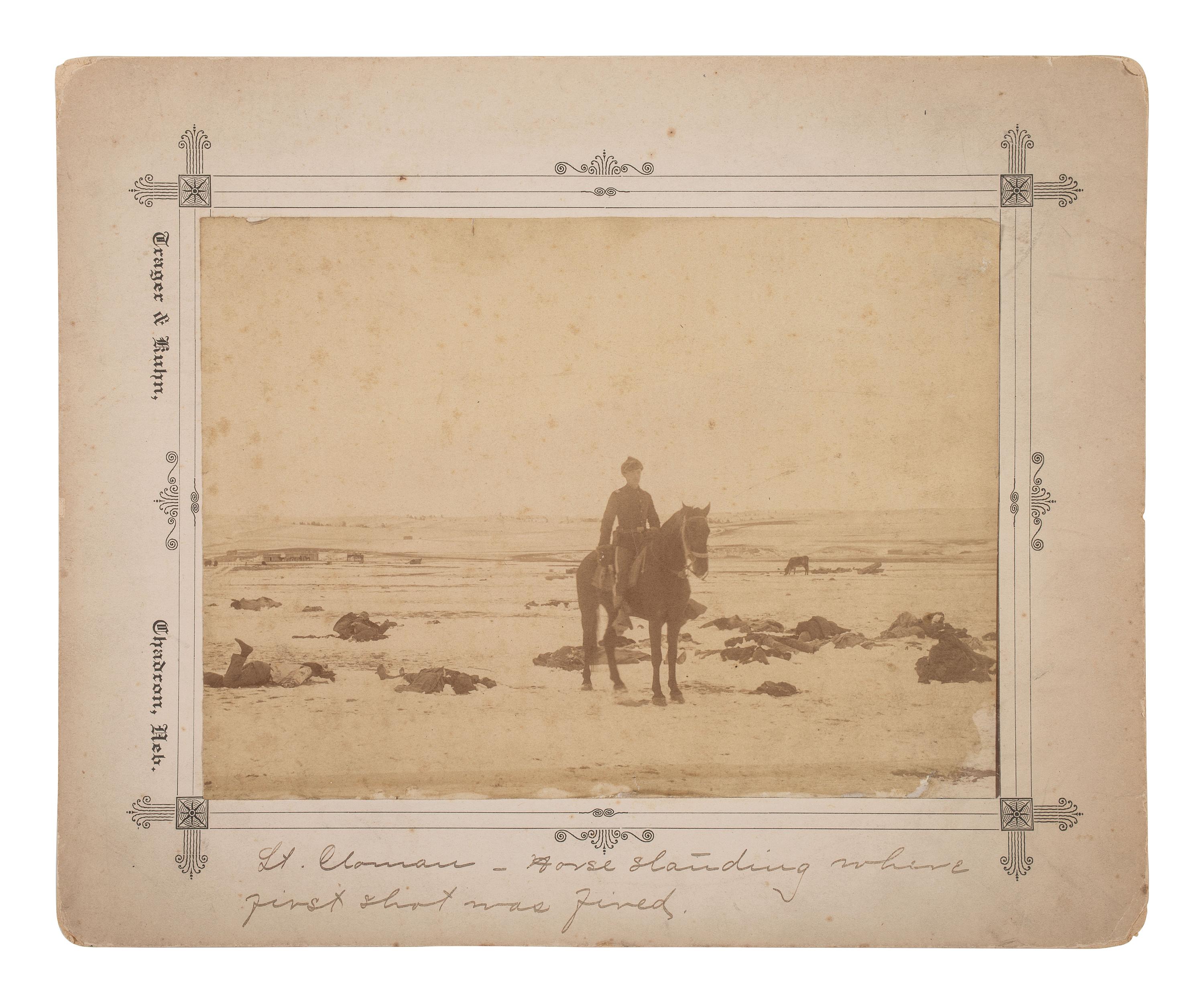 [WOUNDED KNEE]. Four photographs taken in the immediate aftermath of Wounded Knee, incl. Lt. Sydney Cloman on the battlefield surrounded by dead Lakota members of Big Foot’s Band. January 1891.