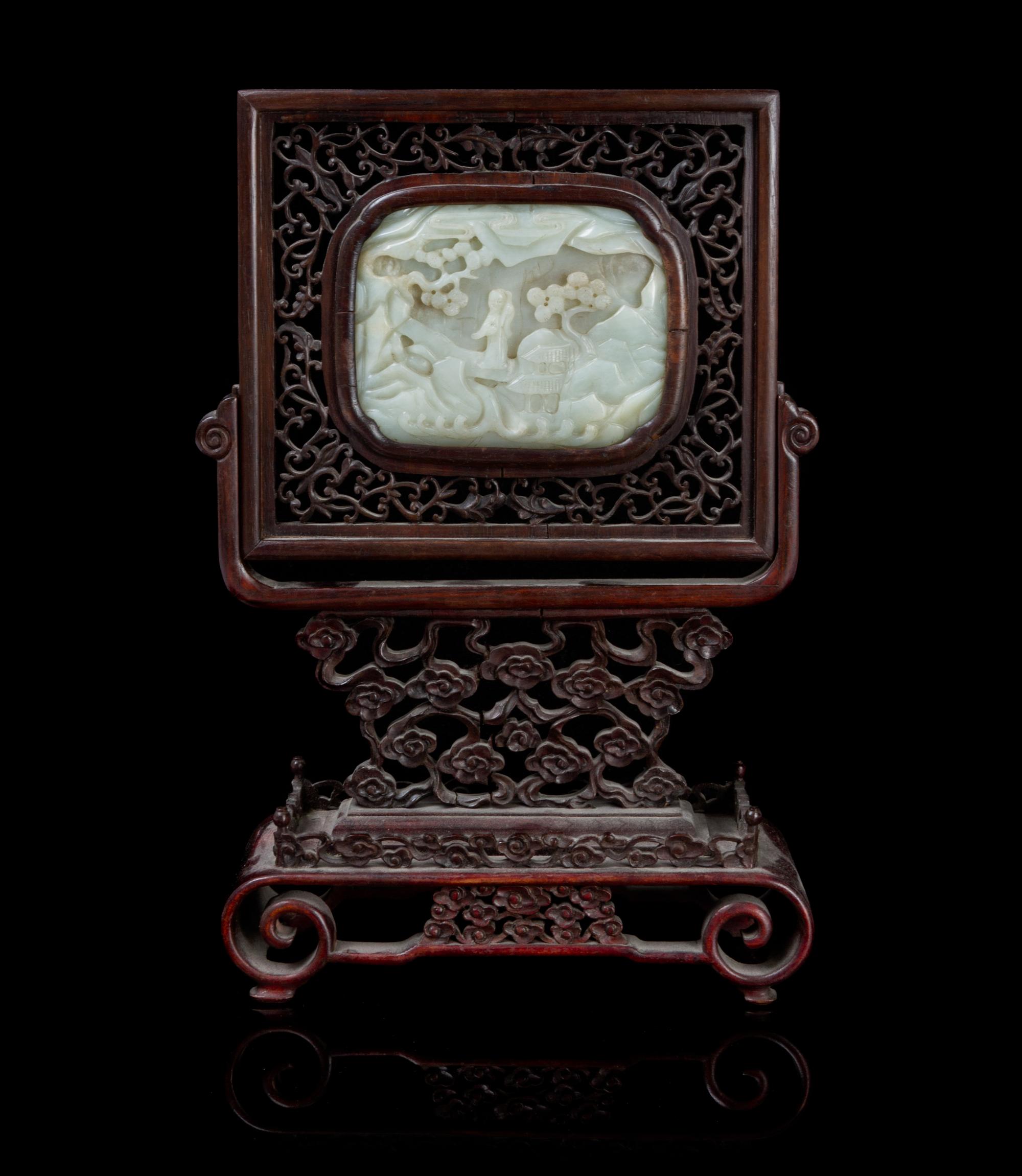 A Carved Jade Plaque Height of stone 3 1/4 x width 4 1/4 inches.