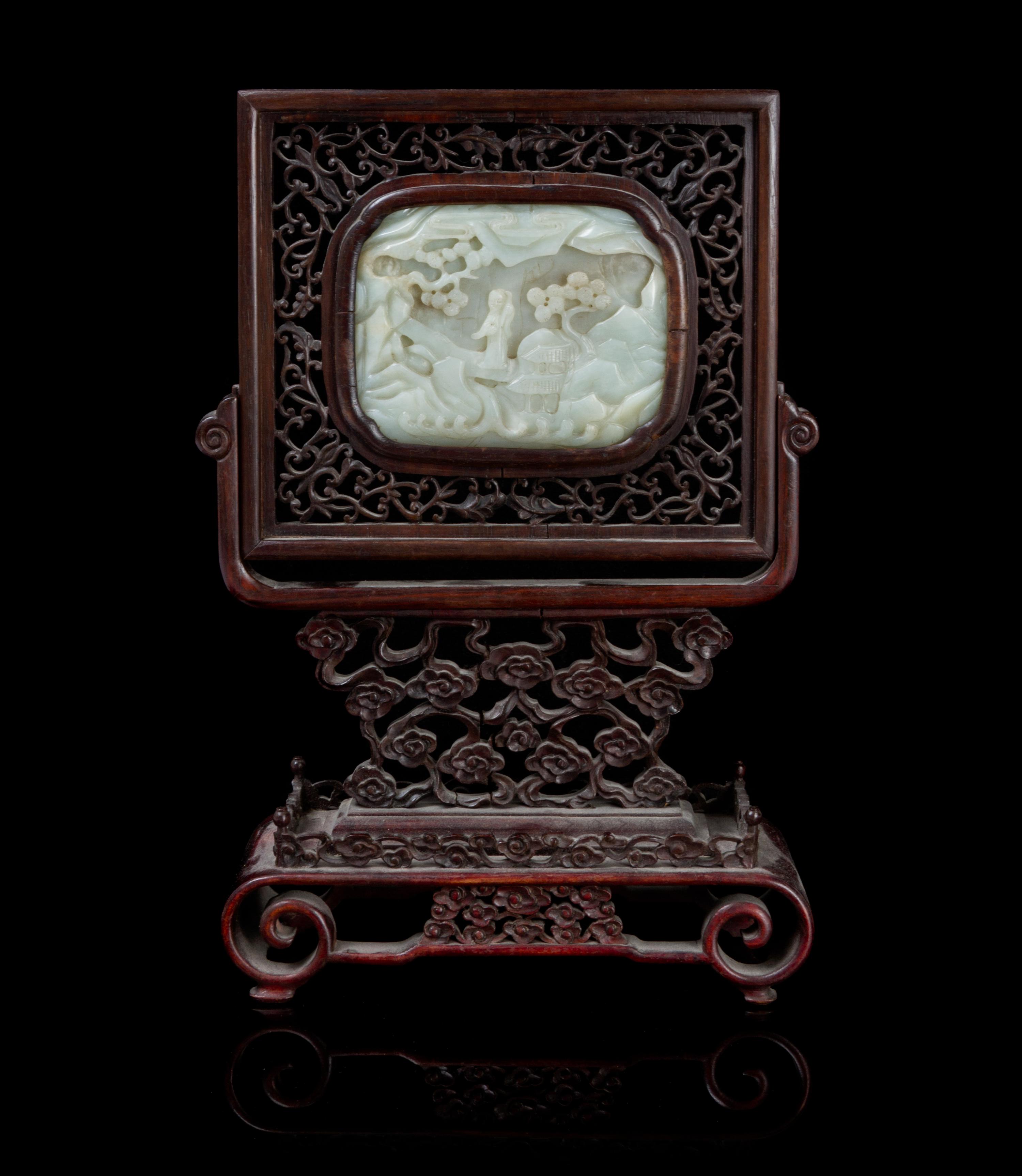 A Carved Jade Plaque Height of stone 3 1/4 x width 4 1/4 inches.