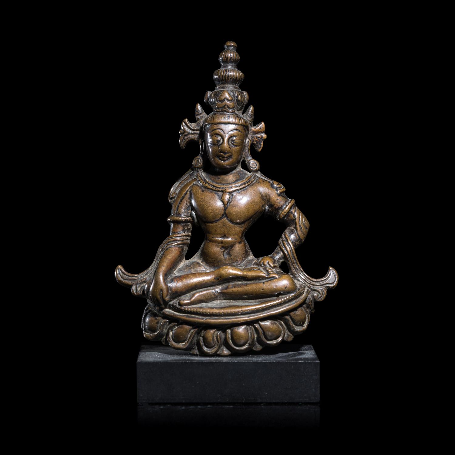 A Western Himalayan Copper Alloy Seated Figure of Avalokiteshvara, 11th/12th Century 十一/十二世紀 喜馬拉雅西麓銅觀音