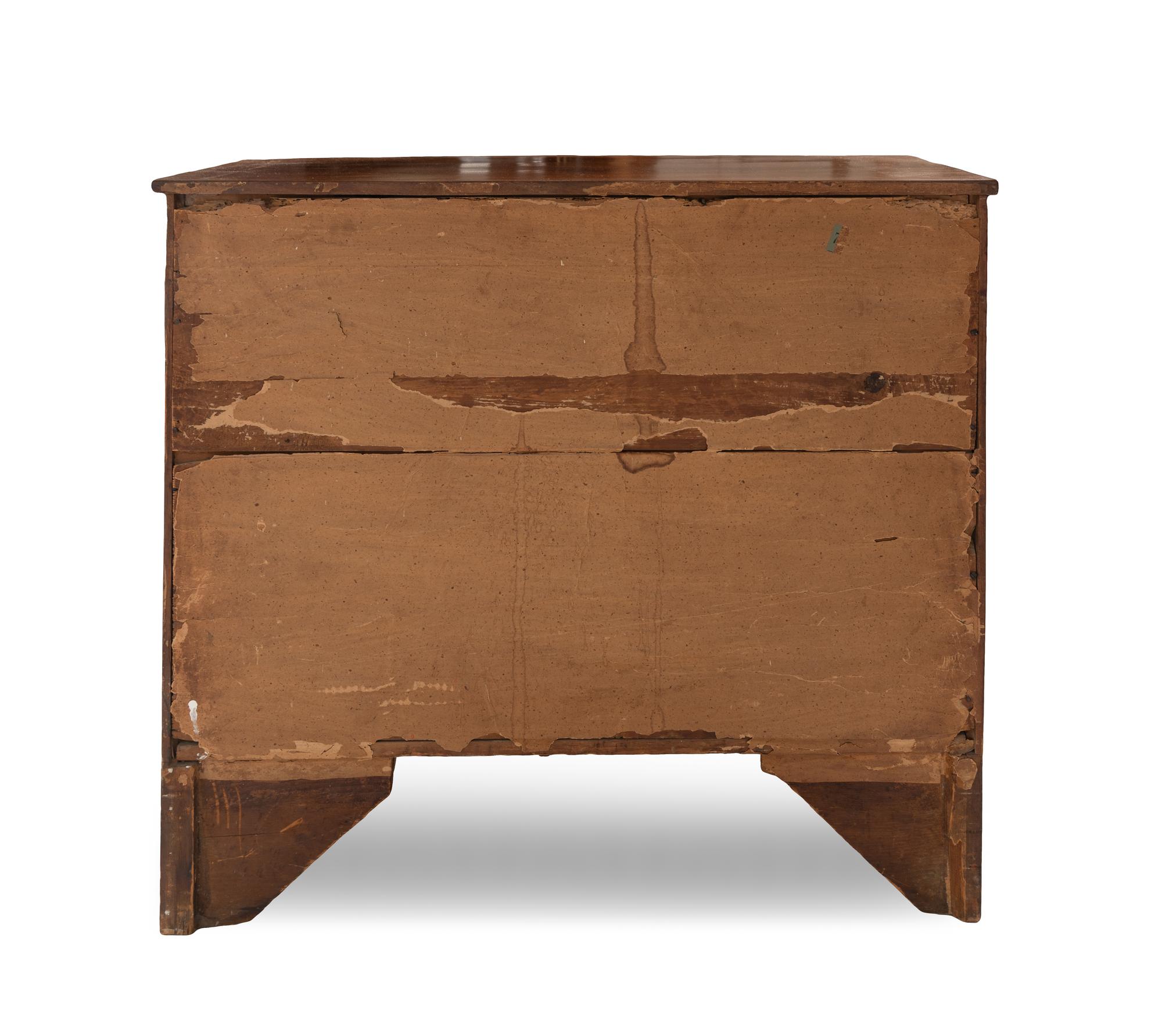 A Federal Inlaid and Figured Mahogany Bow-Front Chest of Drawers