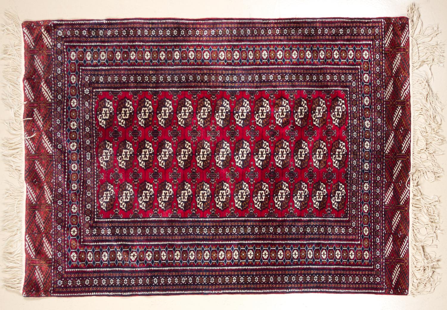 A Bokhara Rug 6 feet 1 inch x 4 feet 2 inches.