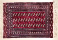 A Bokhara Rug 6 feet 1 inch x 4 feet 2 inches.