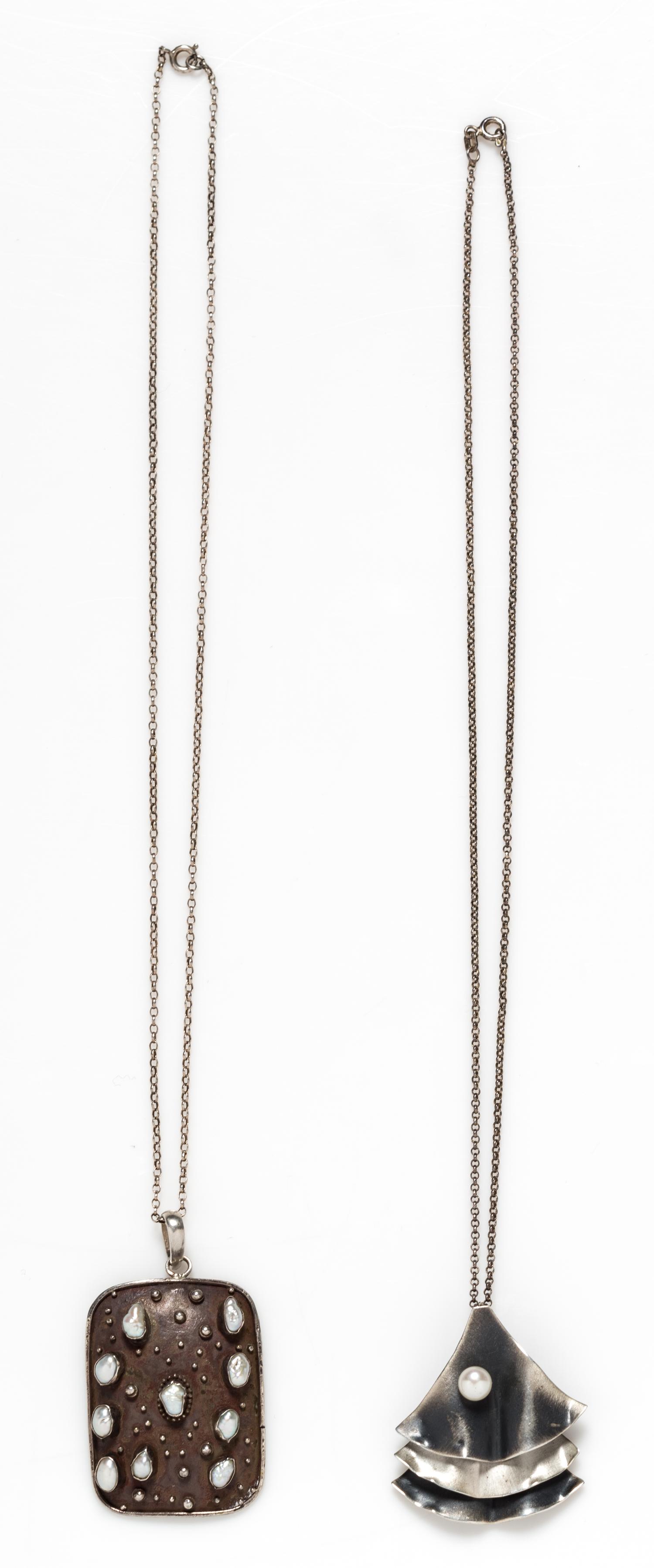 A Collection of Silver and Cultured Pearl Pendants, 13.20 dwts.