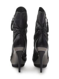 Three Boots and One Pair of Shoes, 1990-2000s