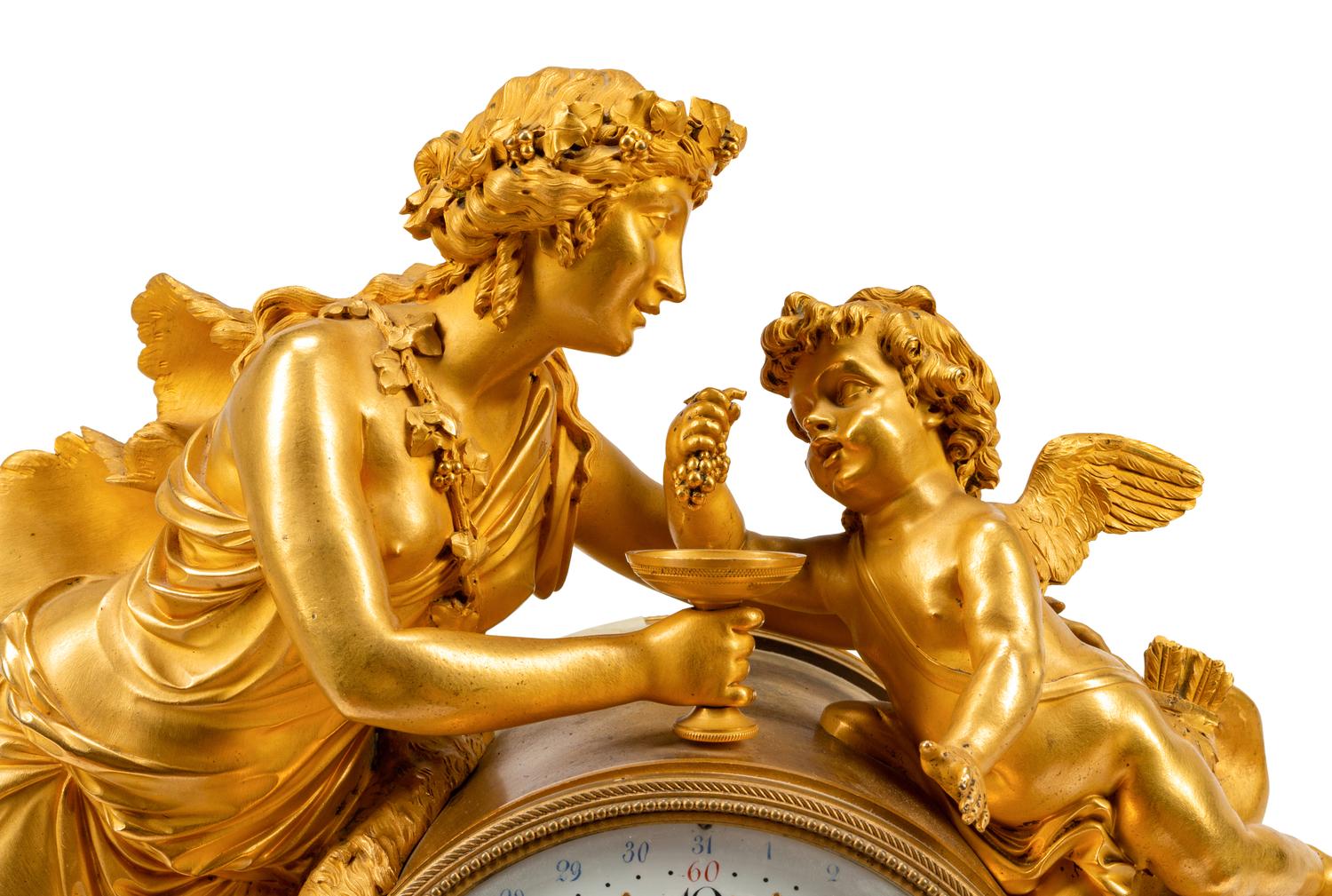 A French Gilt Bronze and Marble Mantel Clock