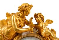 A French Gilt Bronze and Marble Mantel Clock