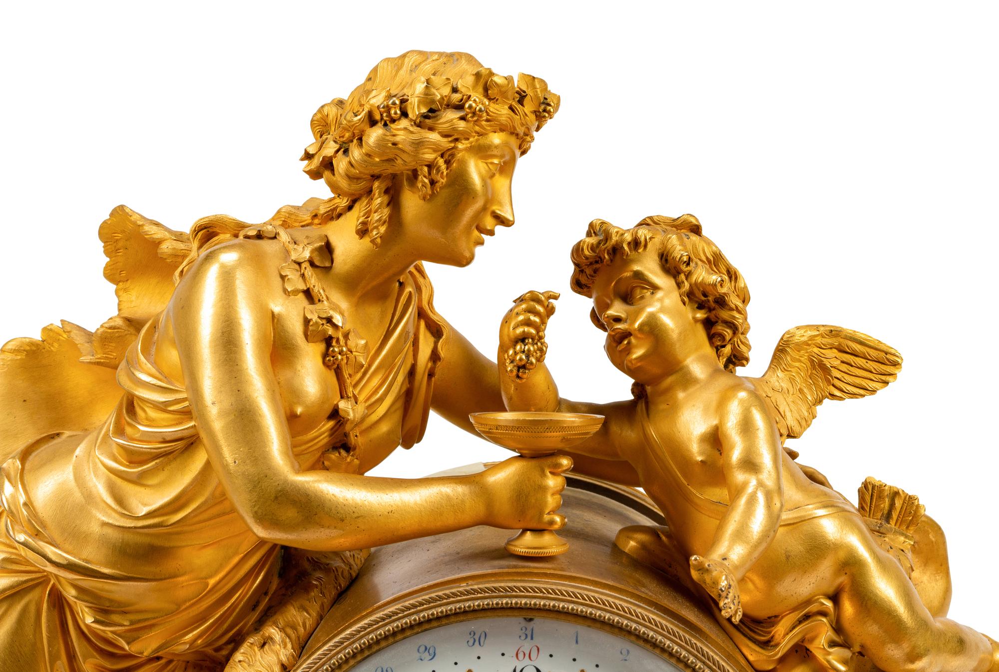 A French Gilt Bronze and Marble Mantel Clock