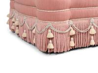 A Custom Button-Tufted Ottoman with Bullion Fringe