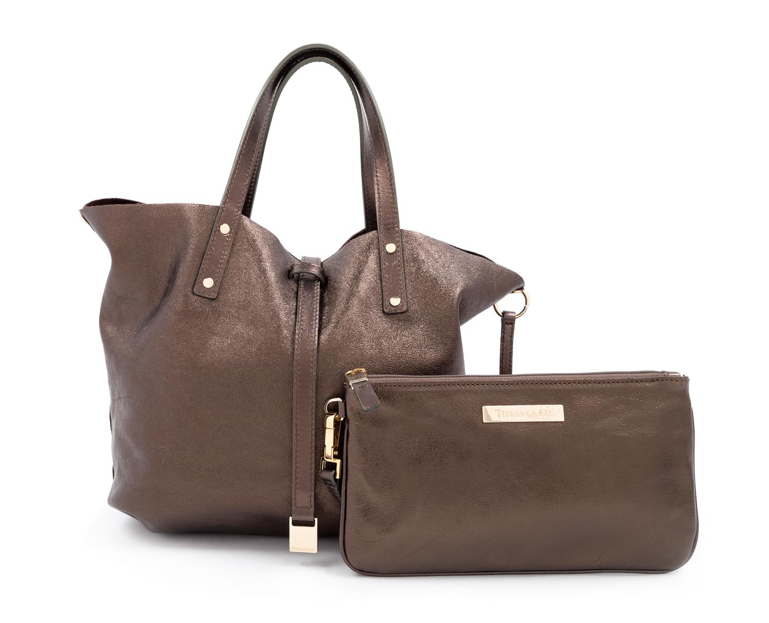 Tiffany & Co Brown Suede Reversible Small Tote with Pouch, 1990-2000s 10" H x 14" W x 4" D; Handle drop: 5"