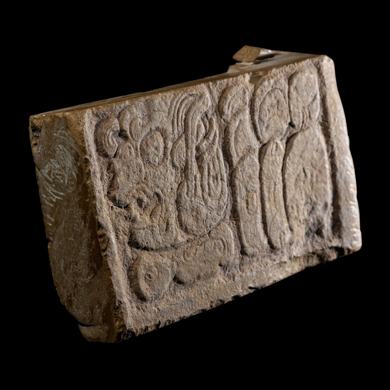 A Maya Limestone Panel with Glyphs
