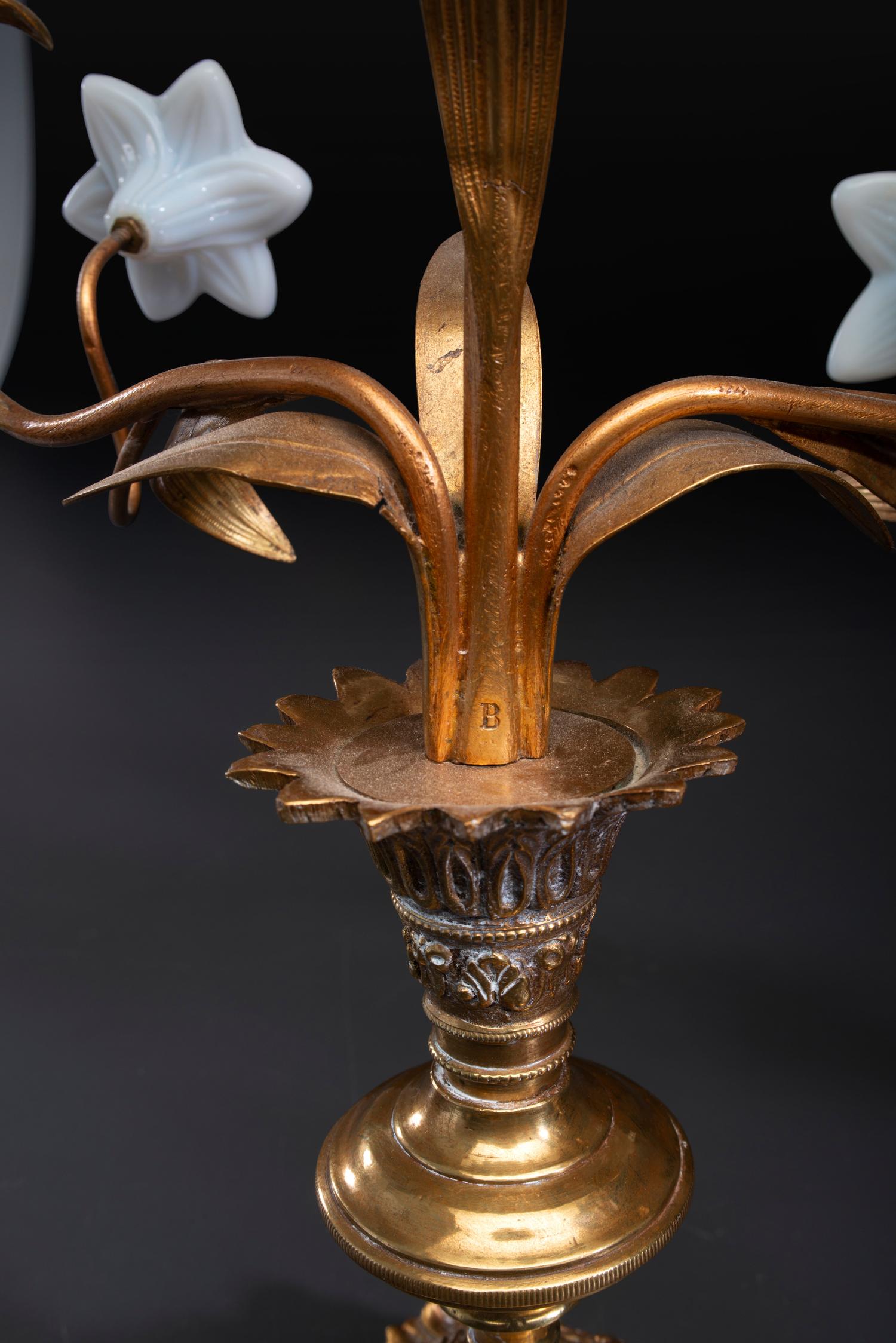 A Pair of French Gilt Metal and Opaline Glass Five-Light Floral Candelabra