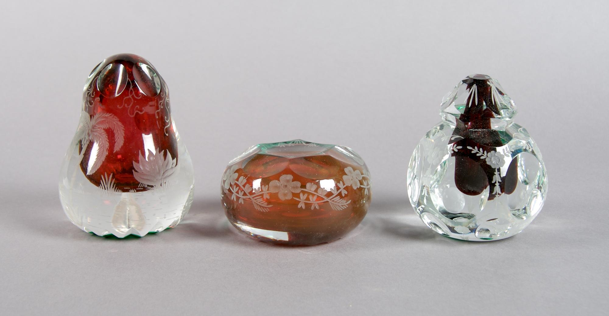 Three Etched Glass Paperweights, Diameter of largest 3 1/2 inches.