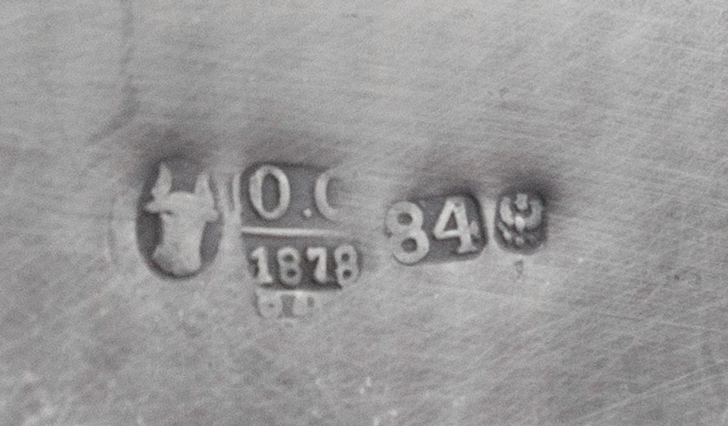 A Russian Silver Spice Box, Maker's Mark Obscured, Assay Mark O.C., Minsk, 1874, the lion form finial above the domed filigree decorate