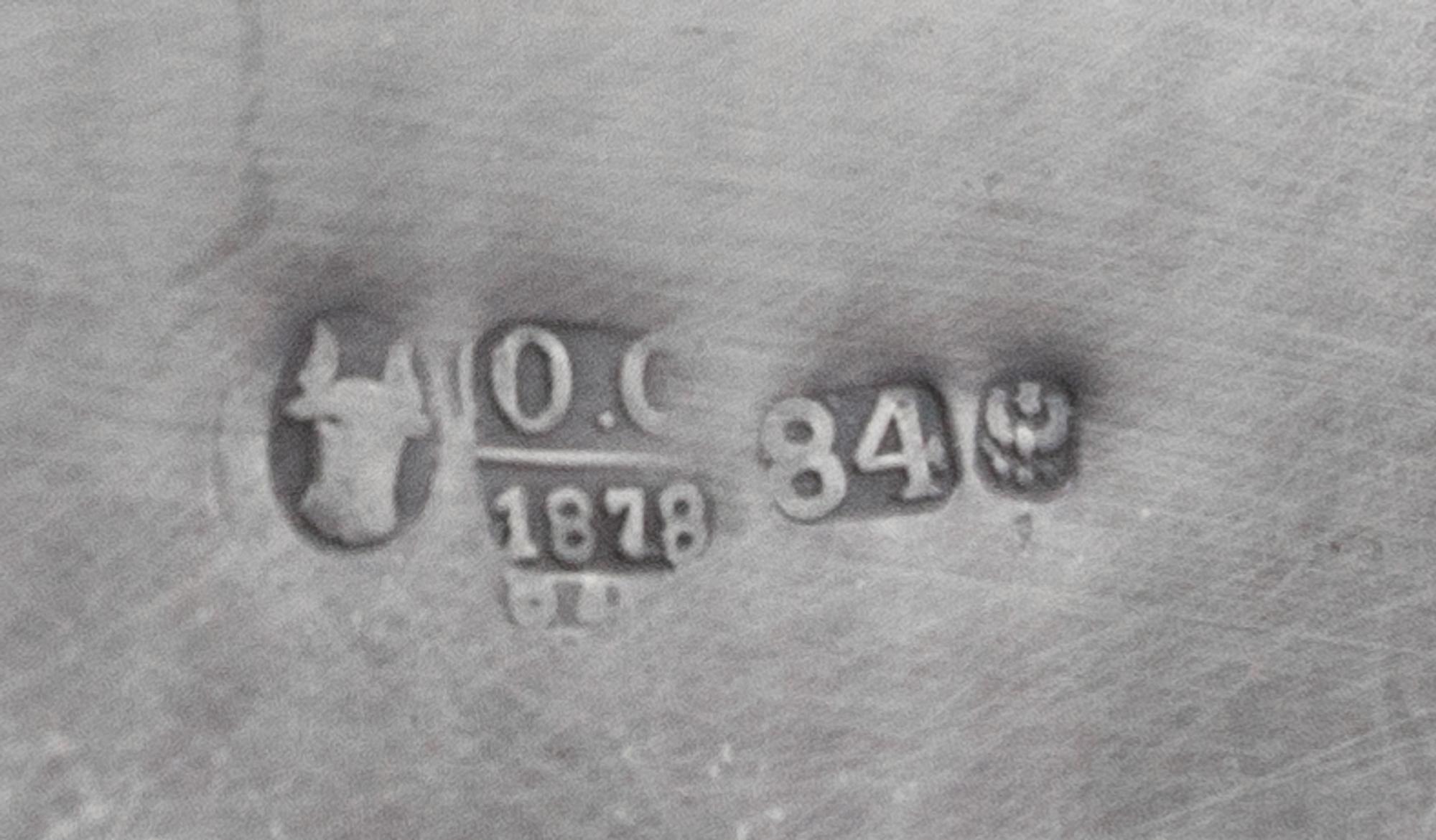 A Russian Silver Spice Box, Maker's Mark Obscured, Assay Mark O.C., Minsk, 1874, the lion form finial above the domed filigree decorate