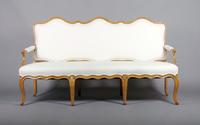 A French Provincial Fruit Wood Settee, Height 43 x width 77 x depth 26 inches.