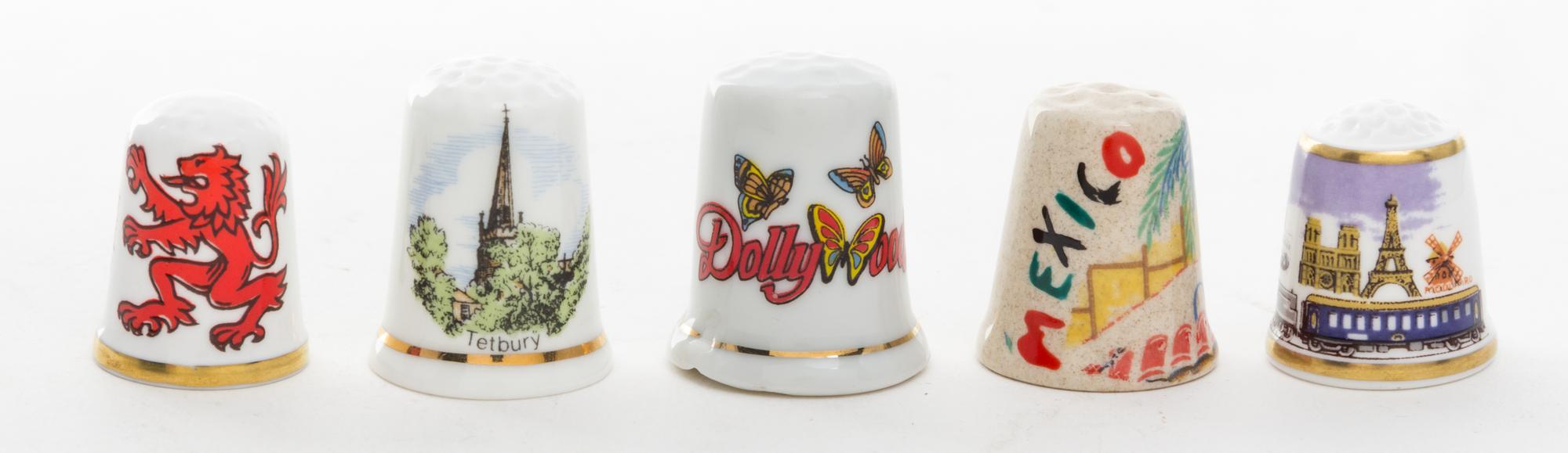A Collection of Five Souvenir Thimbles Height 1 1/8 inches.