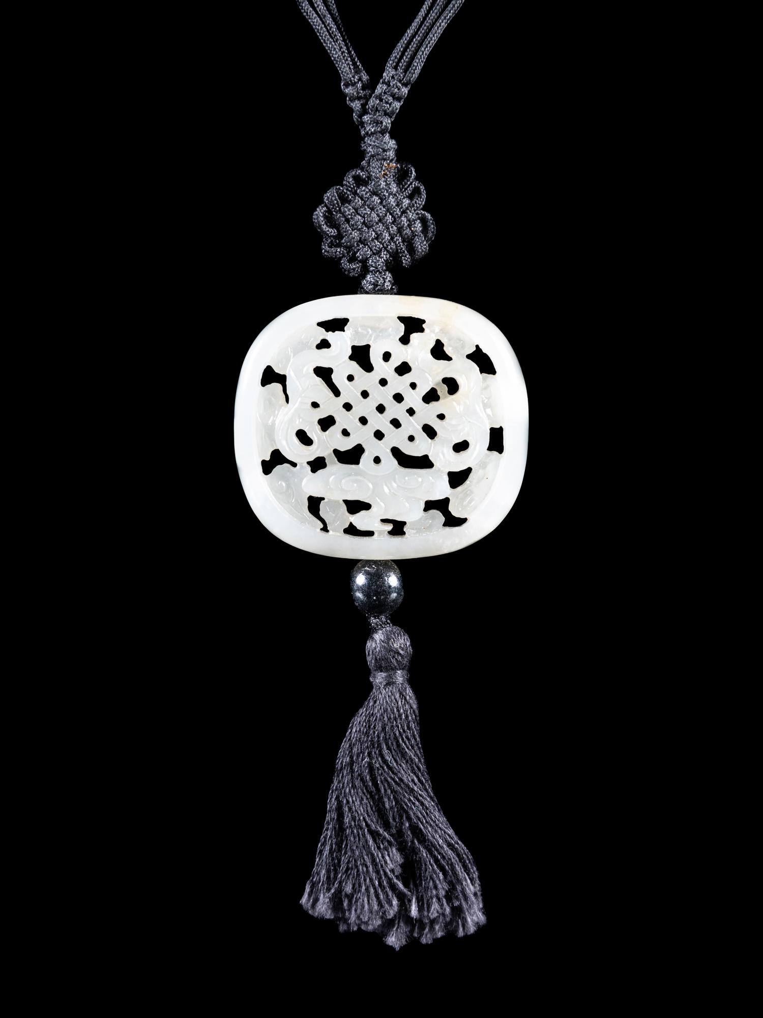 A Partial White Jade Reticulated Parfumier Pendant