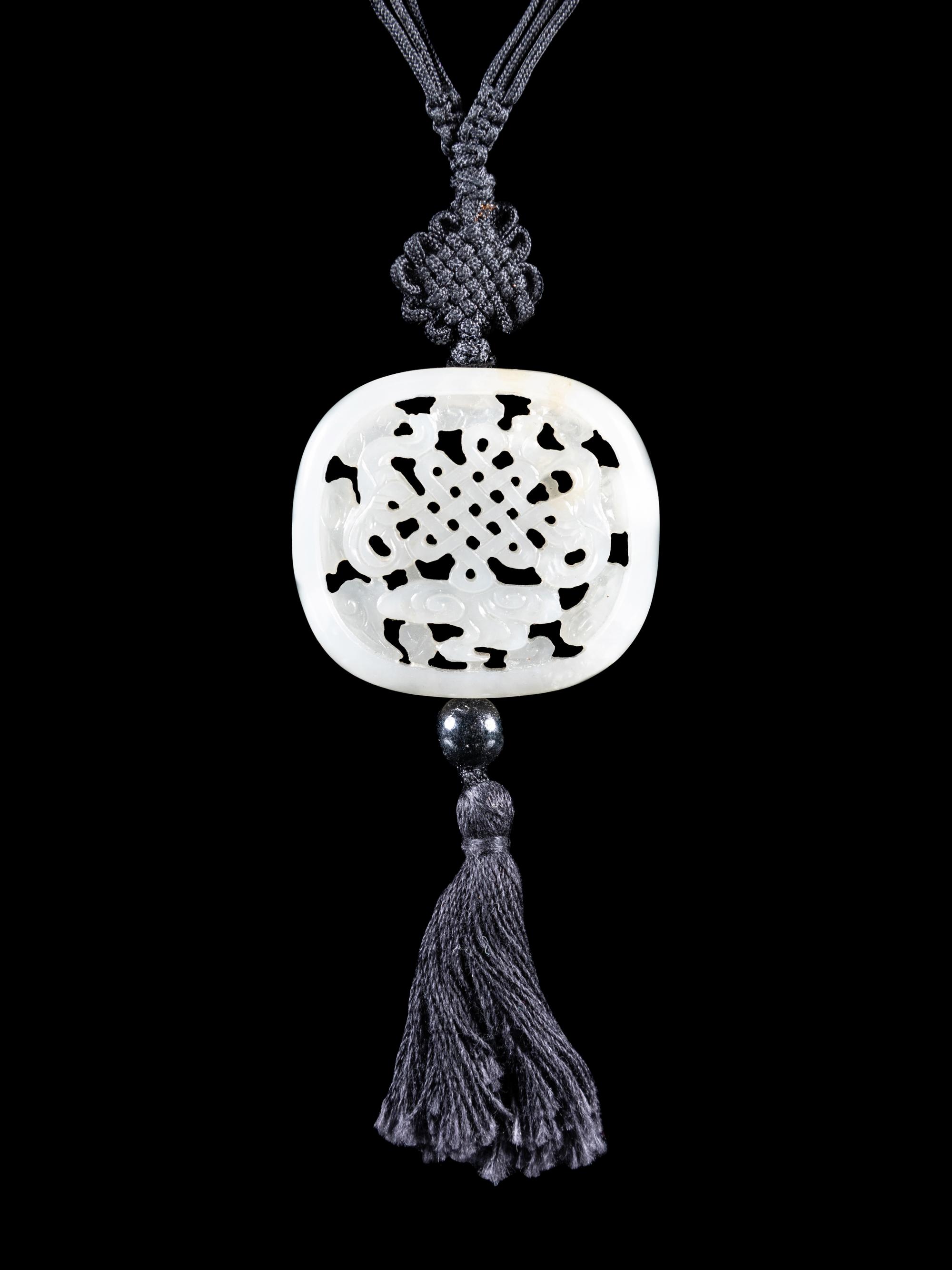A Partial White Jade Reticulated Parfumier Pendant