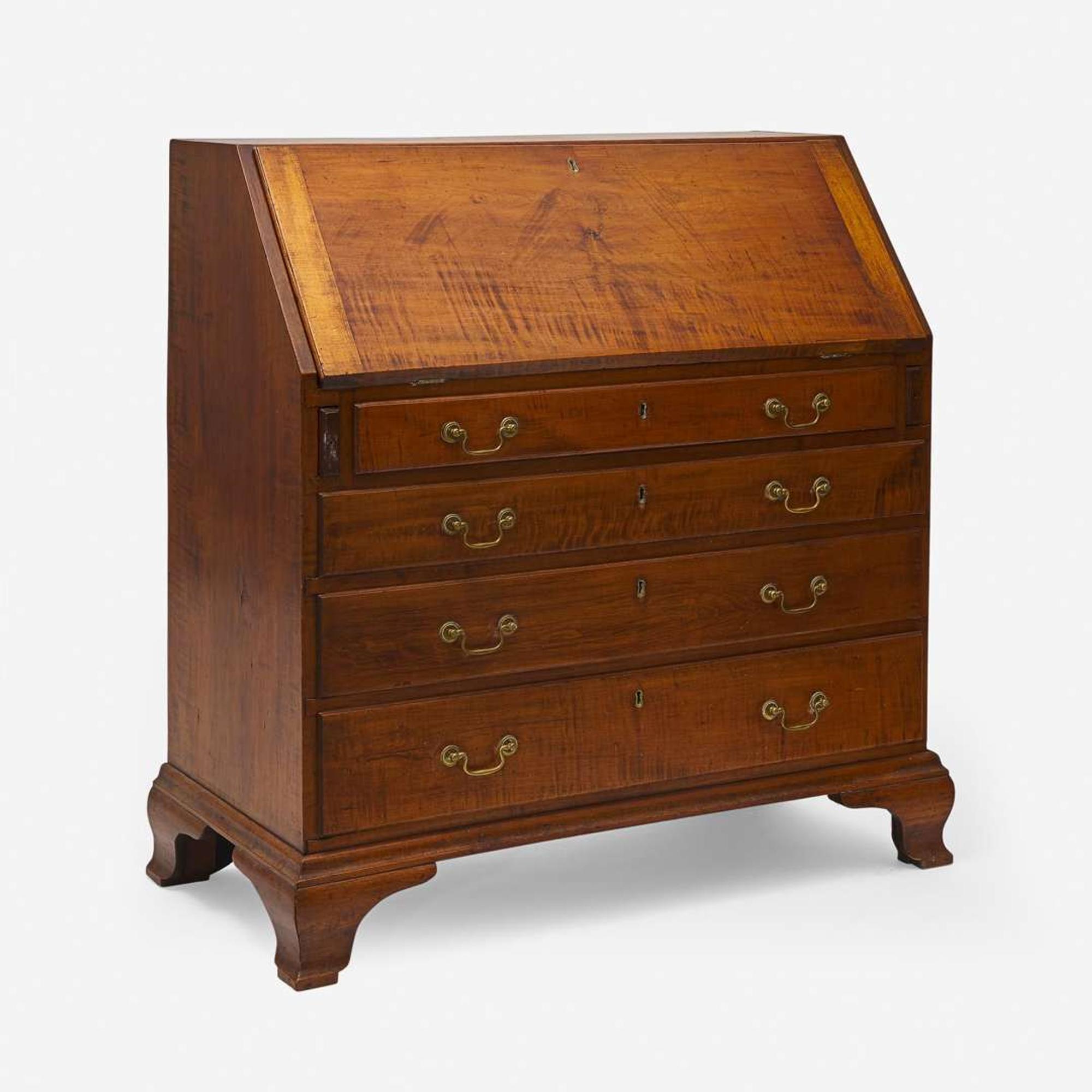 A Chippendale carved tiger maple slant-front desk New England, late 18th century
