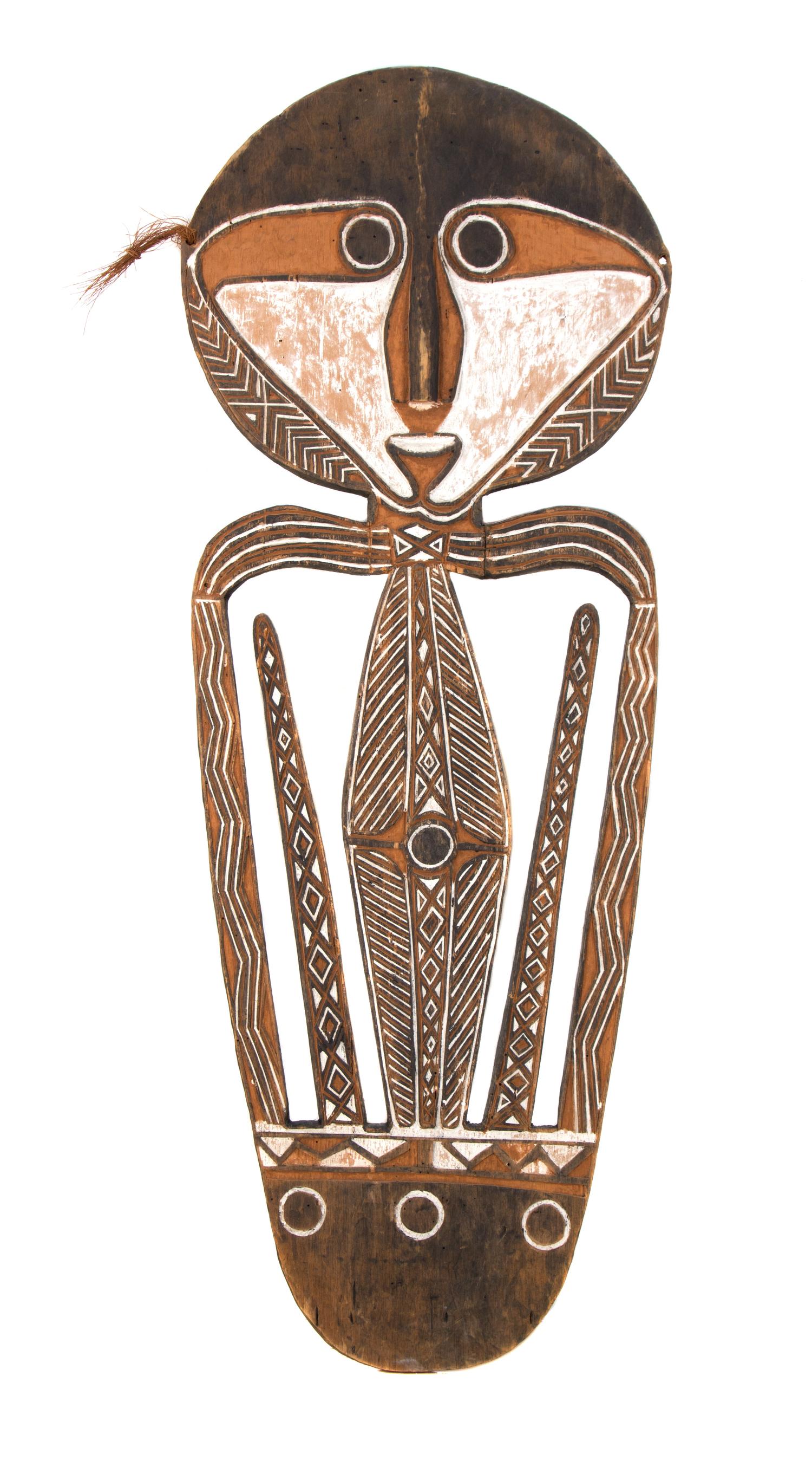 An African Figural Shield Height 44 inches.