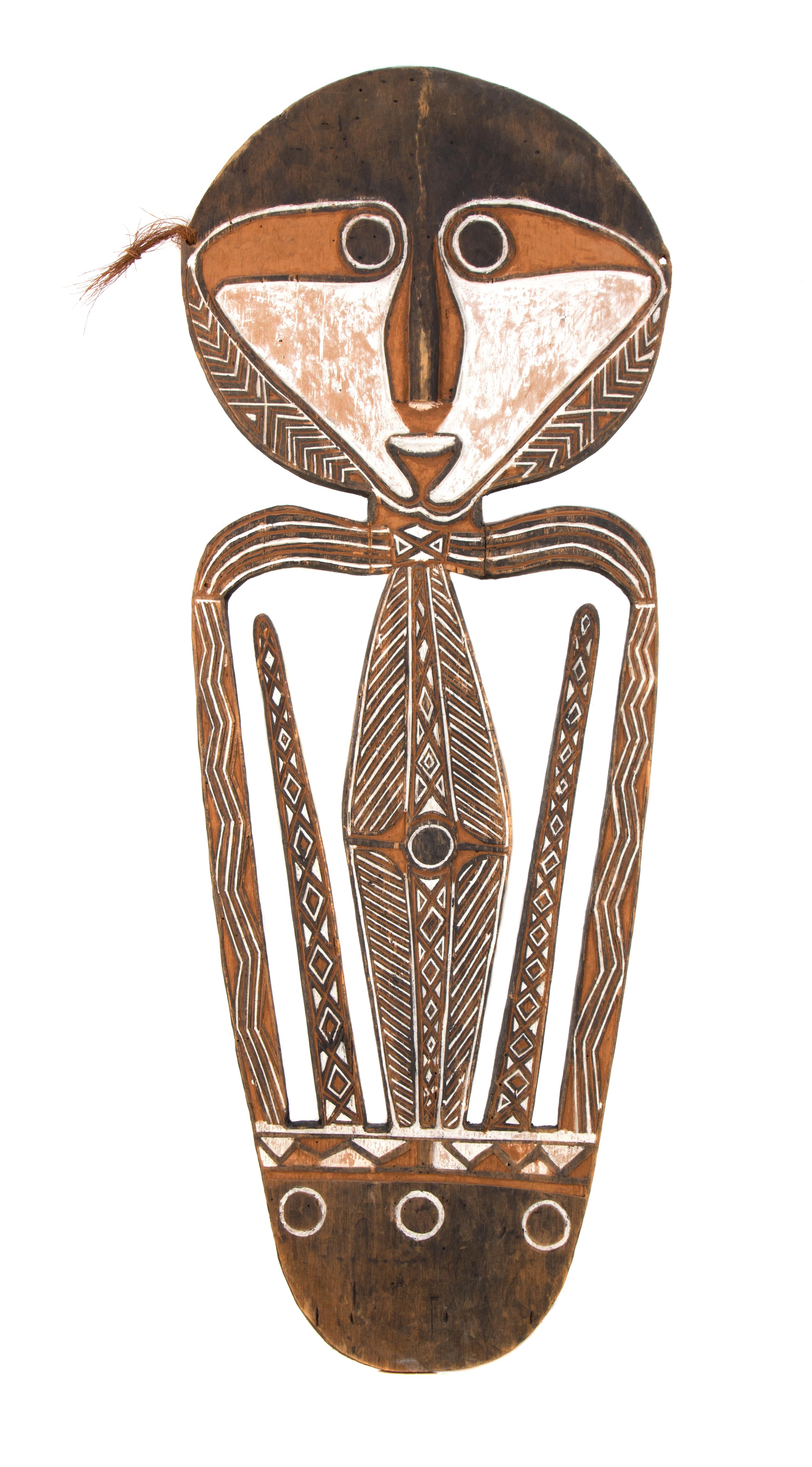 An African Figural Shield Height 44 inches.