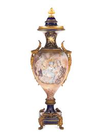 A Sèvres Style Gilt Metal Mounted Porcelain Urn
