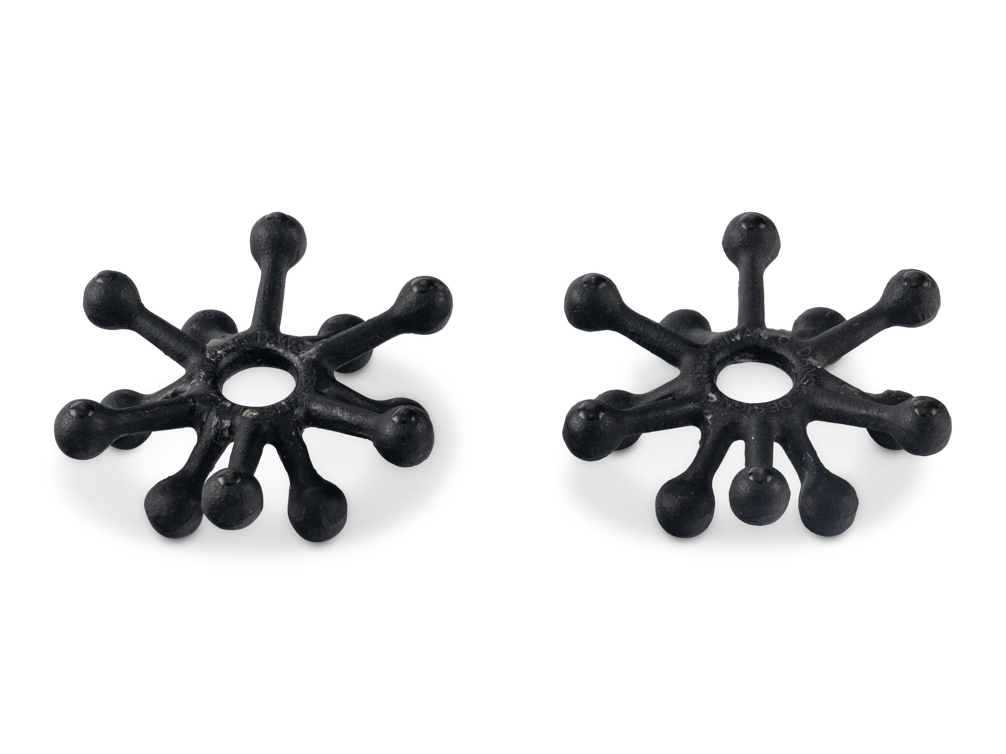 A Pair of Danish Modernist Cast Iron Candle Holders