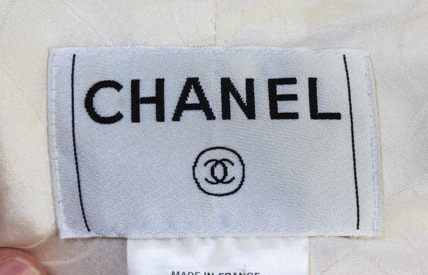 A Chanel Ivory Wool Skirt Suit, Size 40.