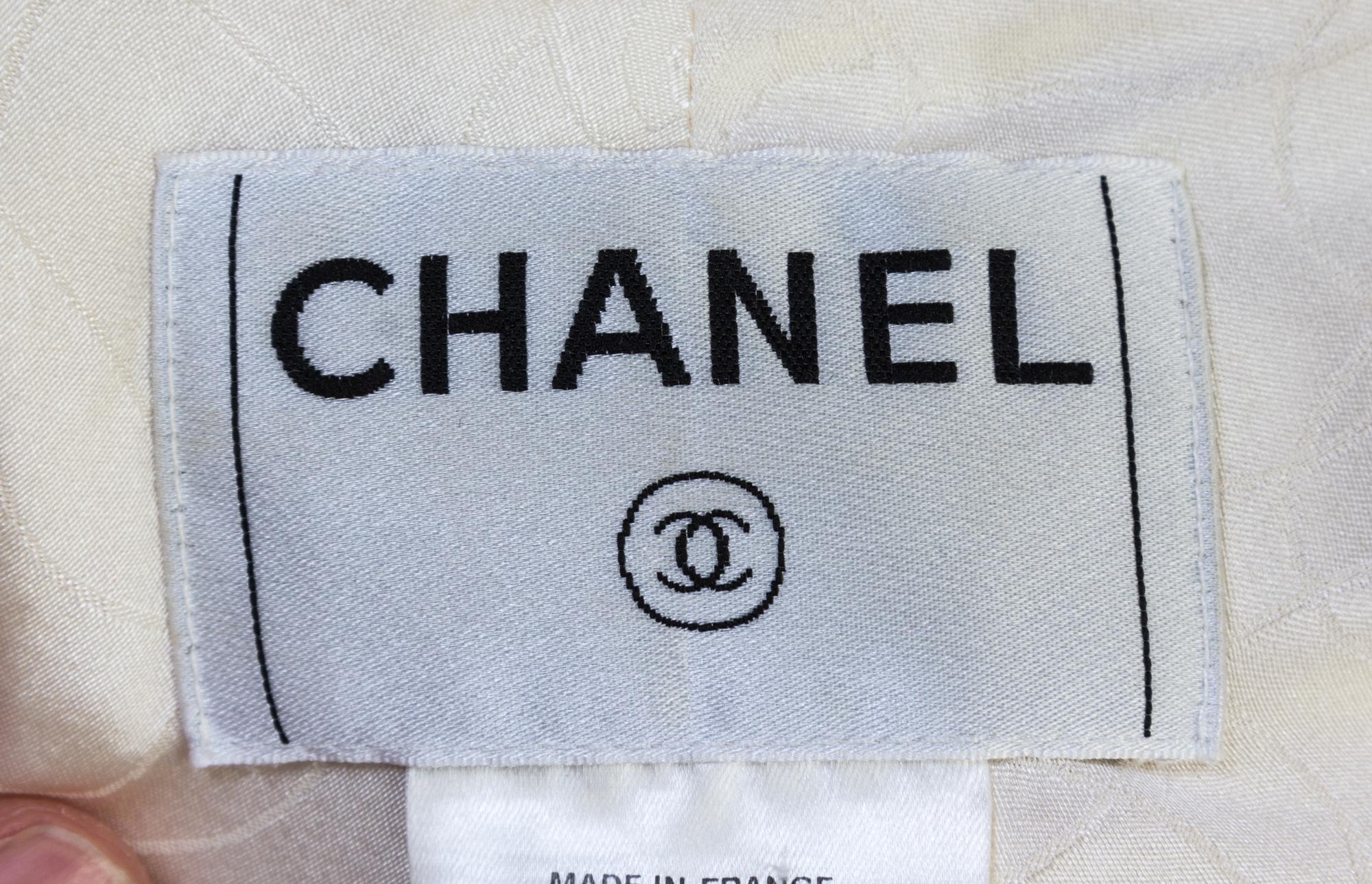 A Chanel Ivory Wool Skirt Suit, Size 40.