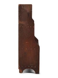 A Country Reddish-Brown Painted Pine Four-Tier Bucket Shelf