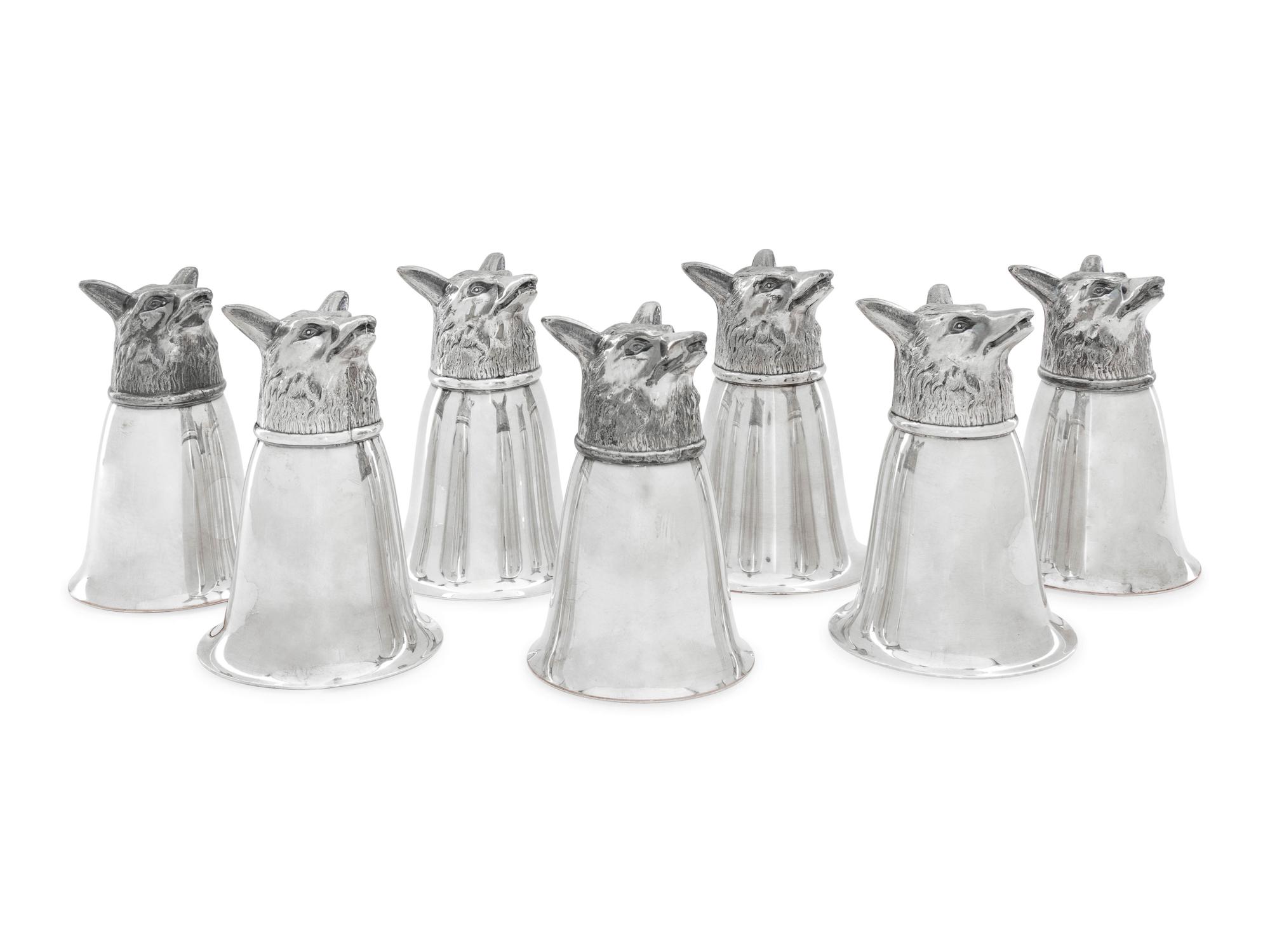 A Set of Seven Silver-Plate Stirrup Cups