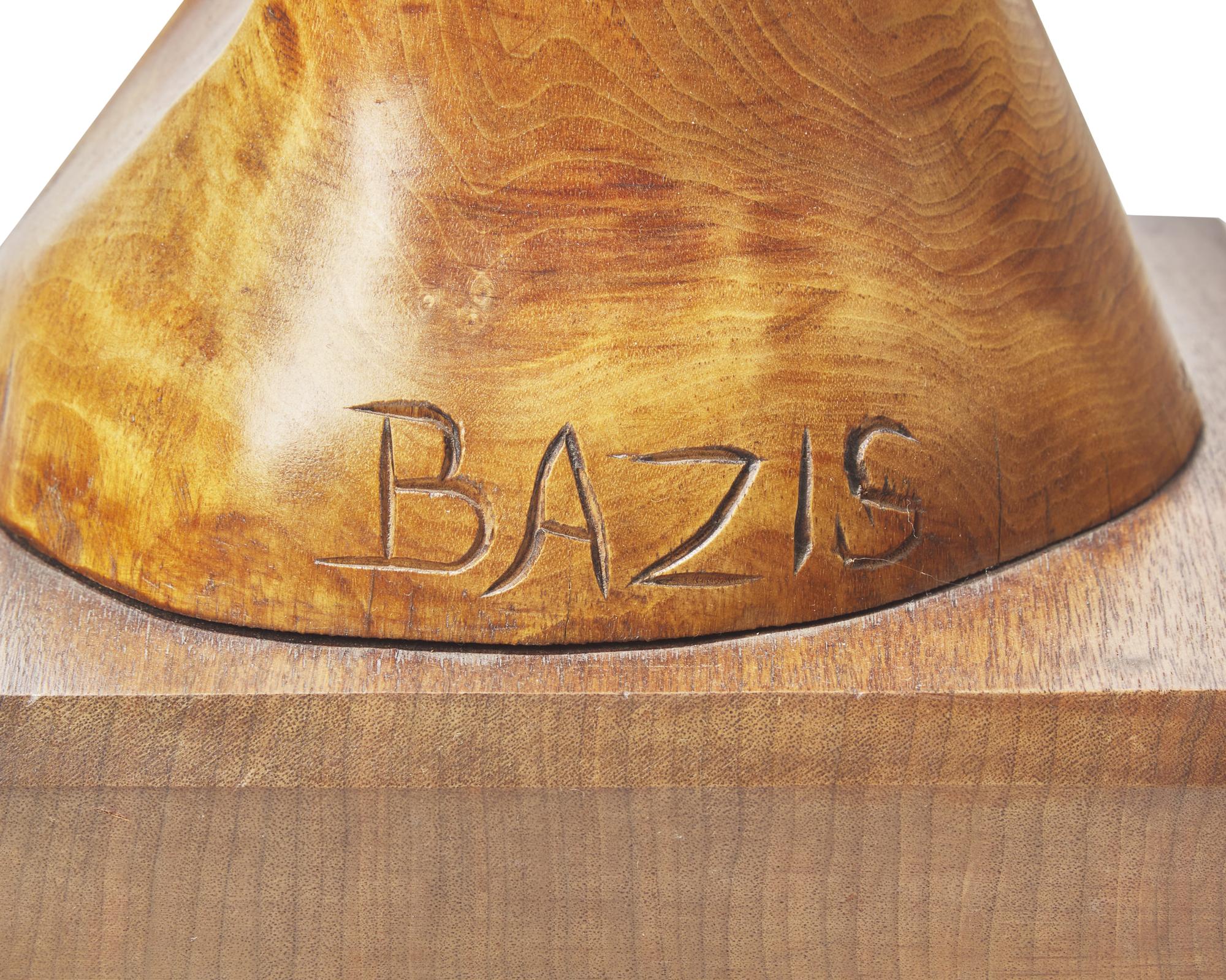 Tom Bazis (b. 1943), A wood carving of a female figure