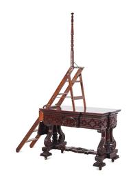 A Continental Carved Mahogany Metamorphic Library Table and Ladder