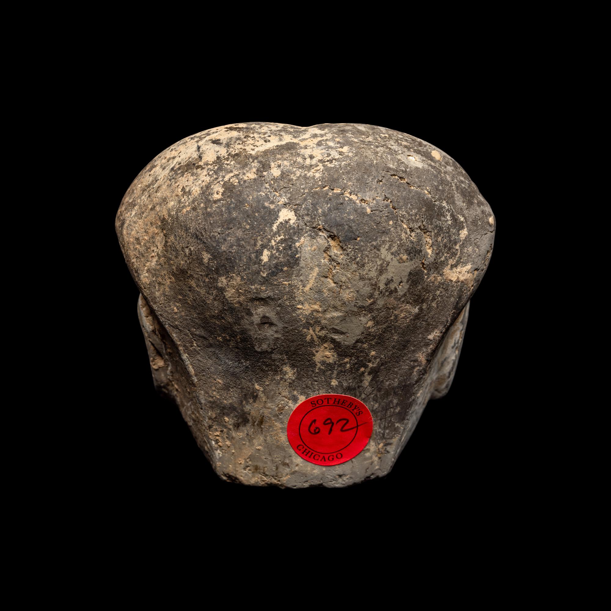 A Chinese Pottery Head of an Attendant