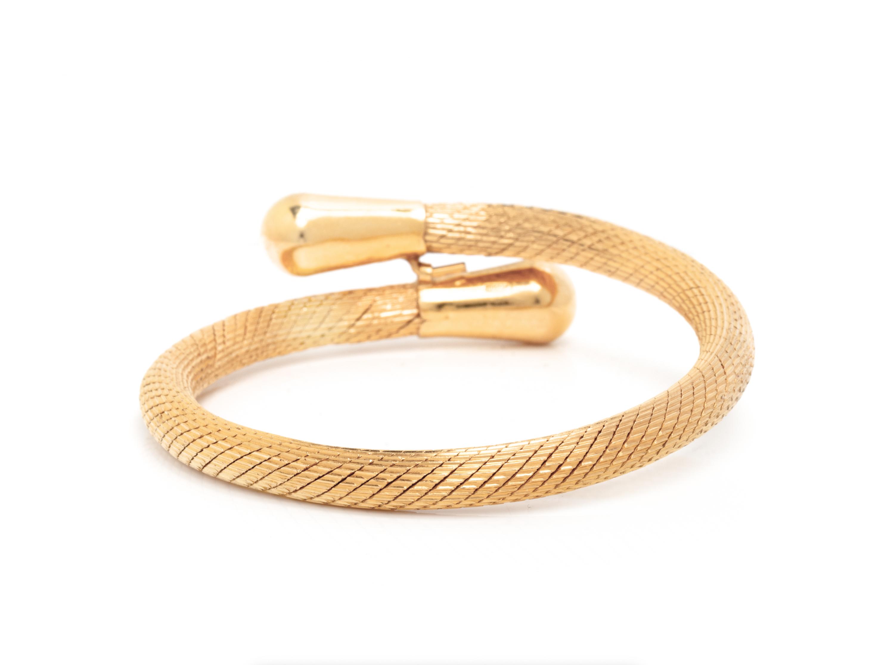HIGH KARAT YELLOW GOLD BANGLE BRACELET