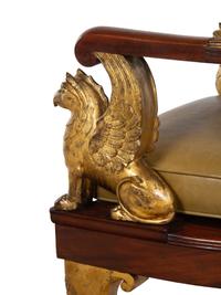 An Empire Parcel Gilt Mahogany Fauteuil