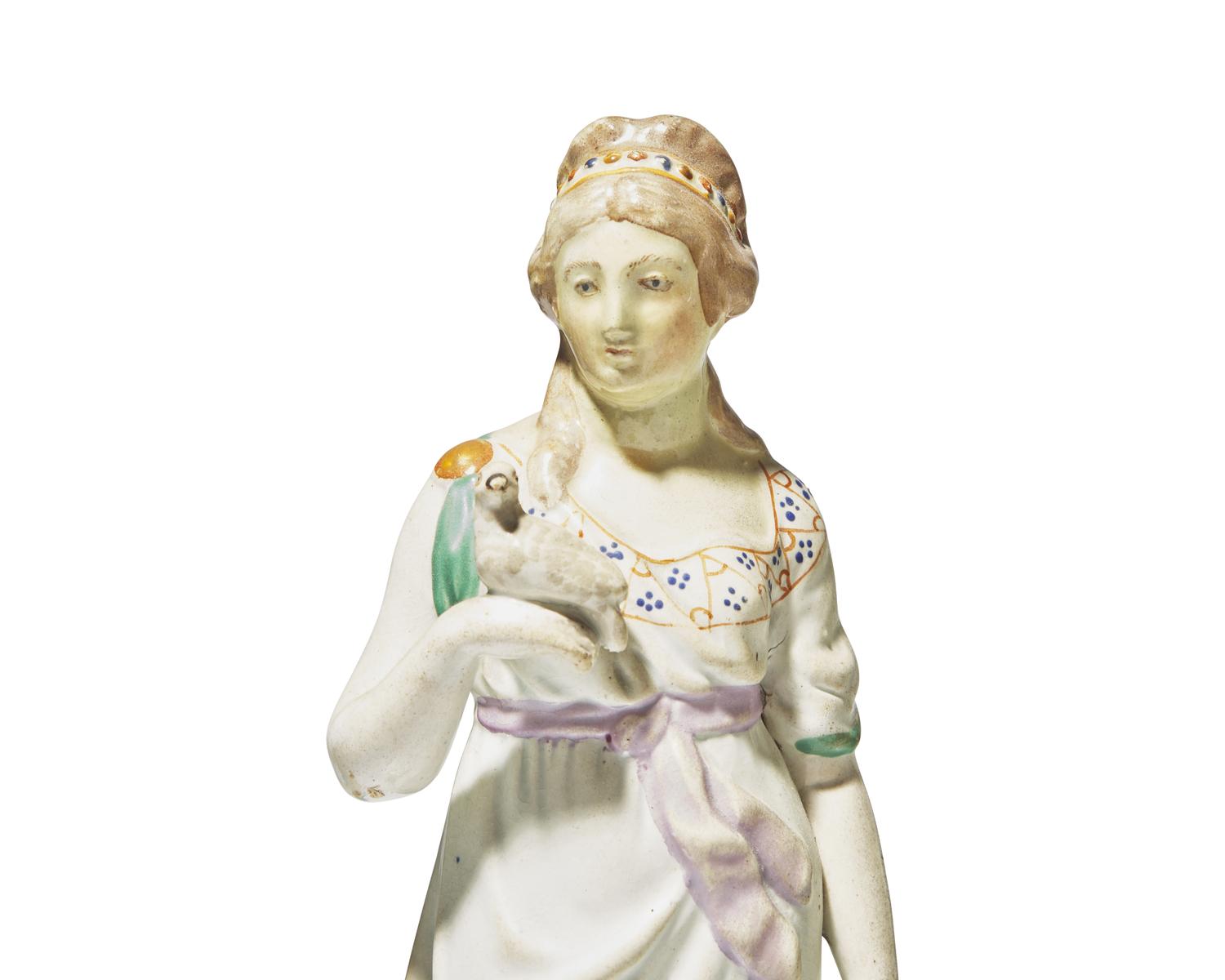 A collection of eight Staffordshire figures, England, late 18th / early 19th century