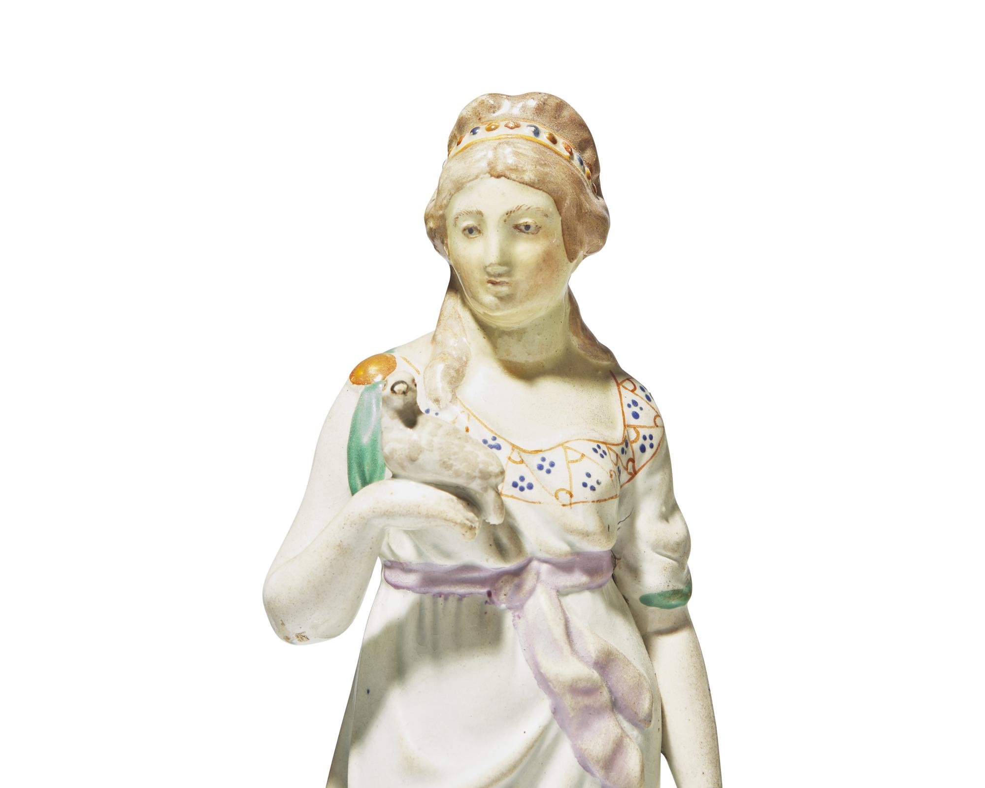A collection of eight Staffordshire figures, England, late 18th / early 19th century