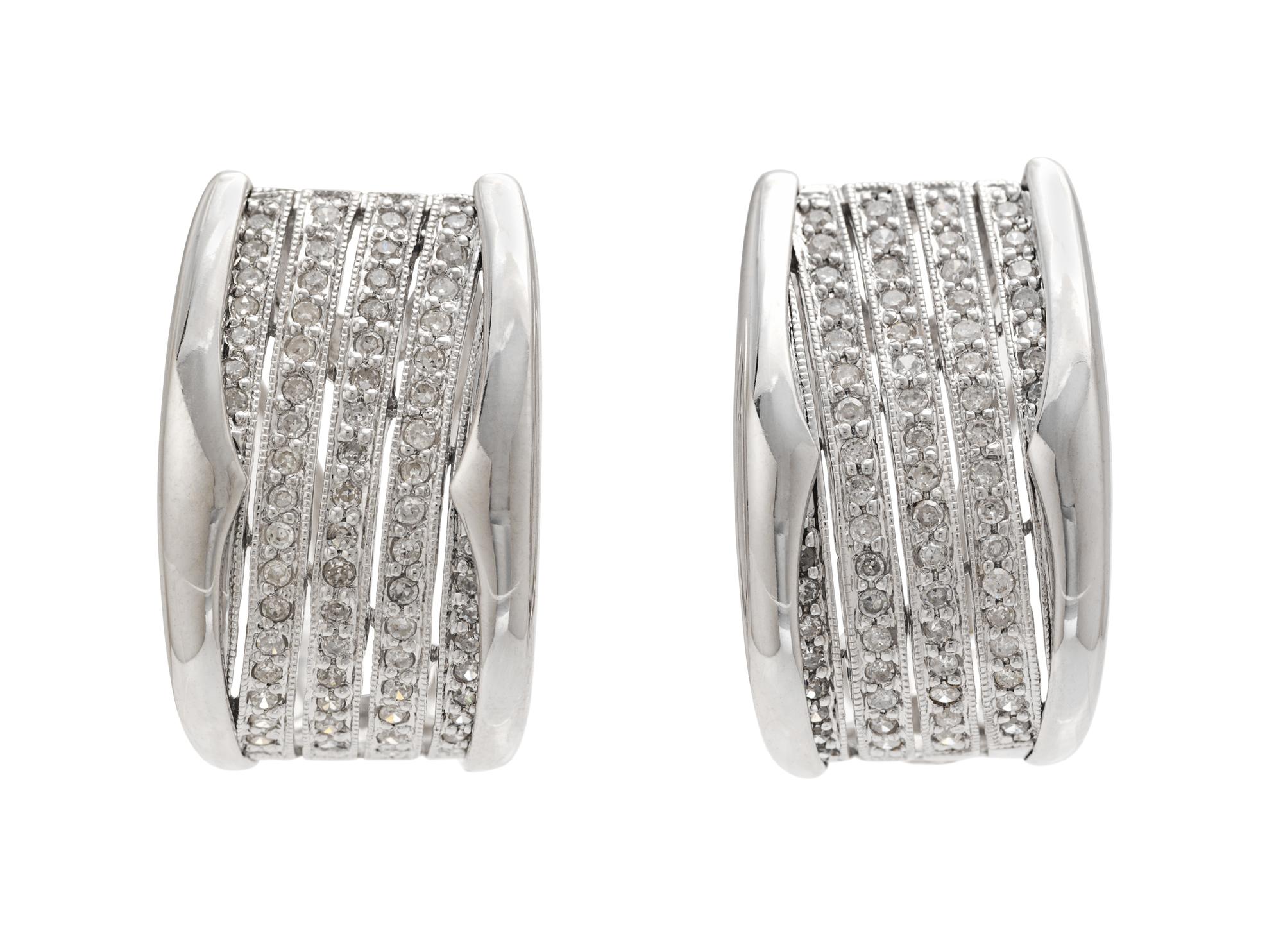 A 14 Karat White Gold and Diamond Demi Parure, 17.80 dwts.