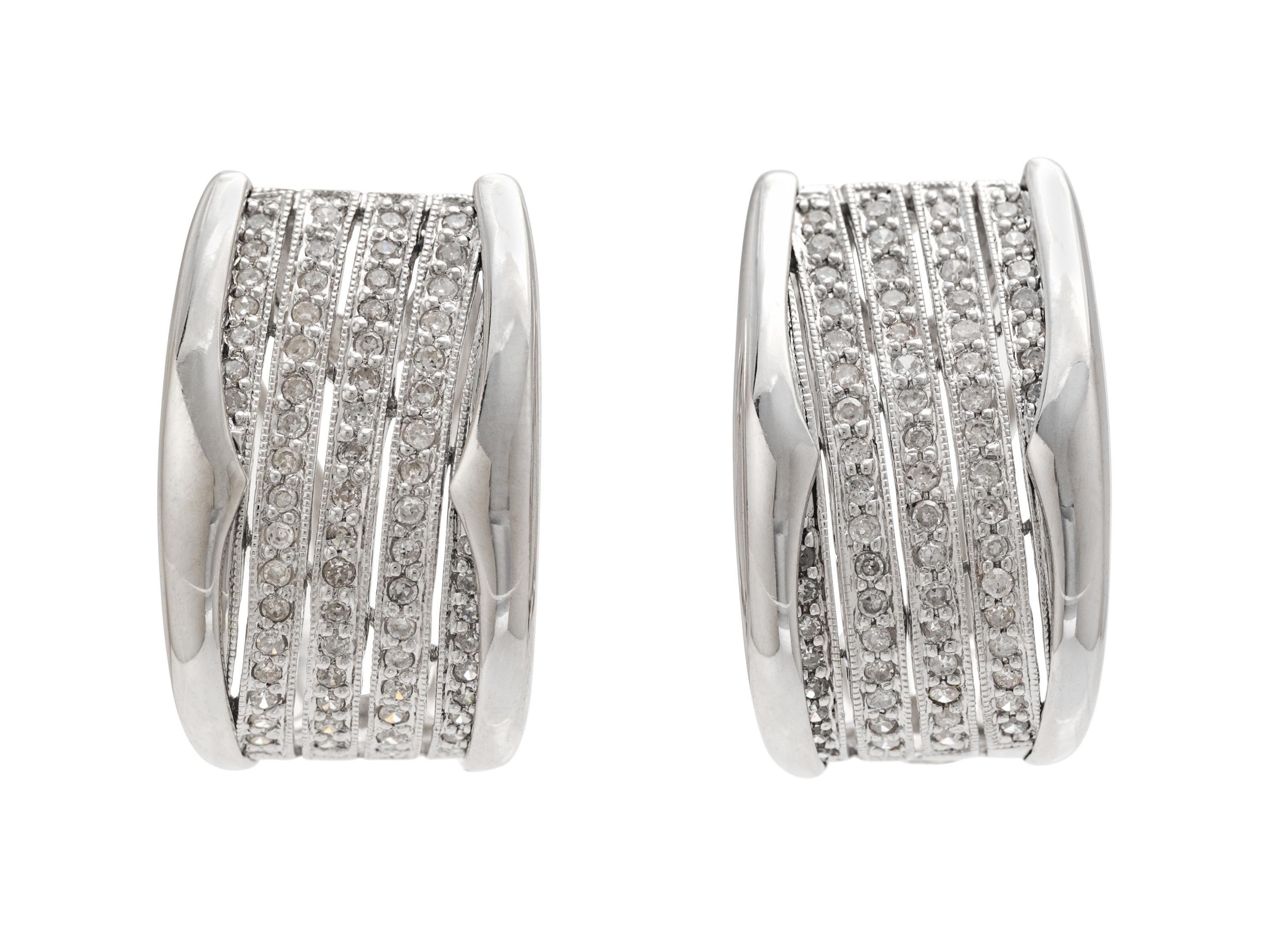A 14 Karat White Gold and Diamond Demi Parure, 17.80 dwts.