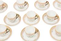 A Set of Twenty-Six Royal Copenhagen Flora Danica Porcelain Coffee Cups and Saucers