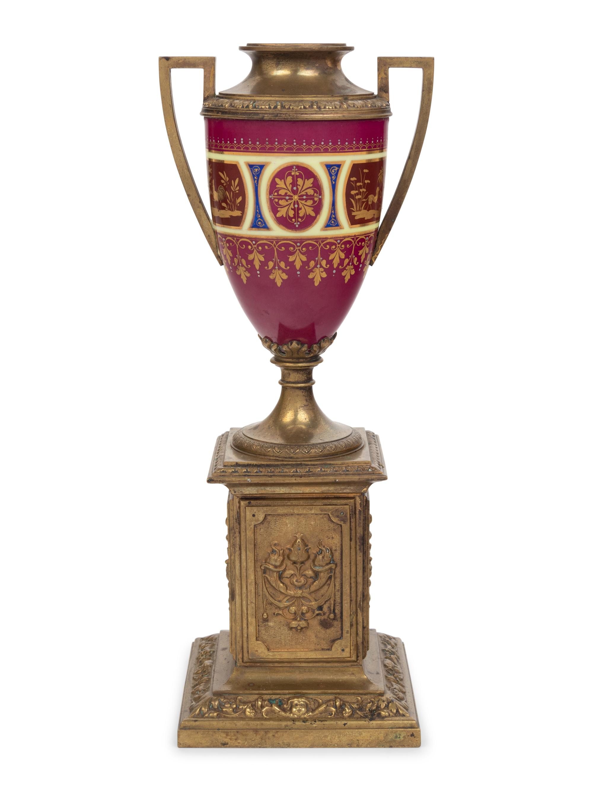 A Vienna Style Gilt Bronze Mounted Porcelain Urn