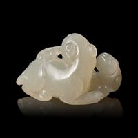 A Chinese Pale Celadon Jade ‘Double Badger' Group, Qing Dynasty — 清 青白玉雙歡珮