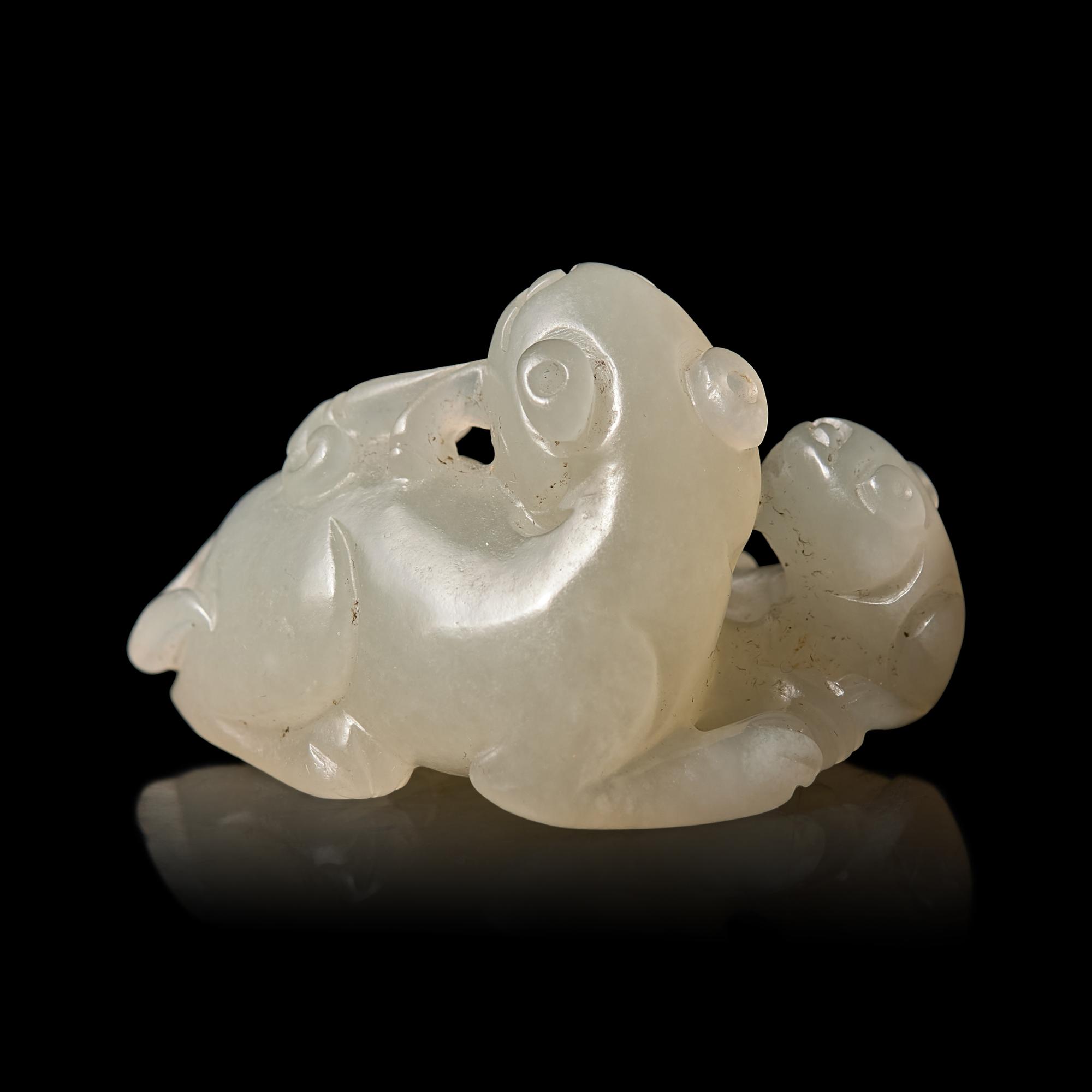 A Chinese Pale Celadon Jade ‘Double Badger' Group, Qing Dynasty — 清 青白玉雙歡珮