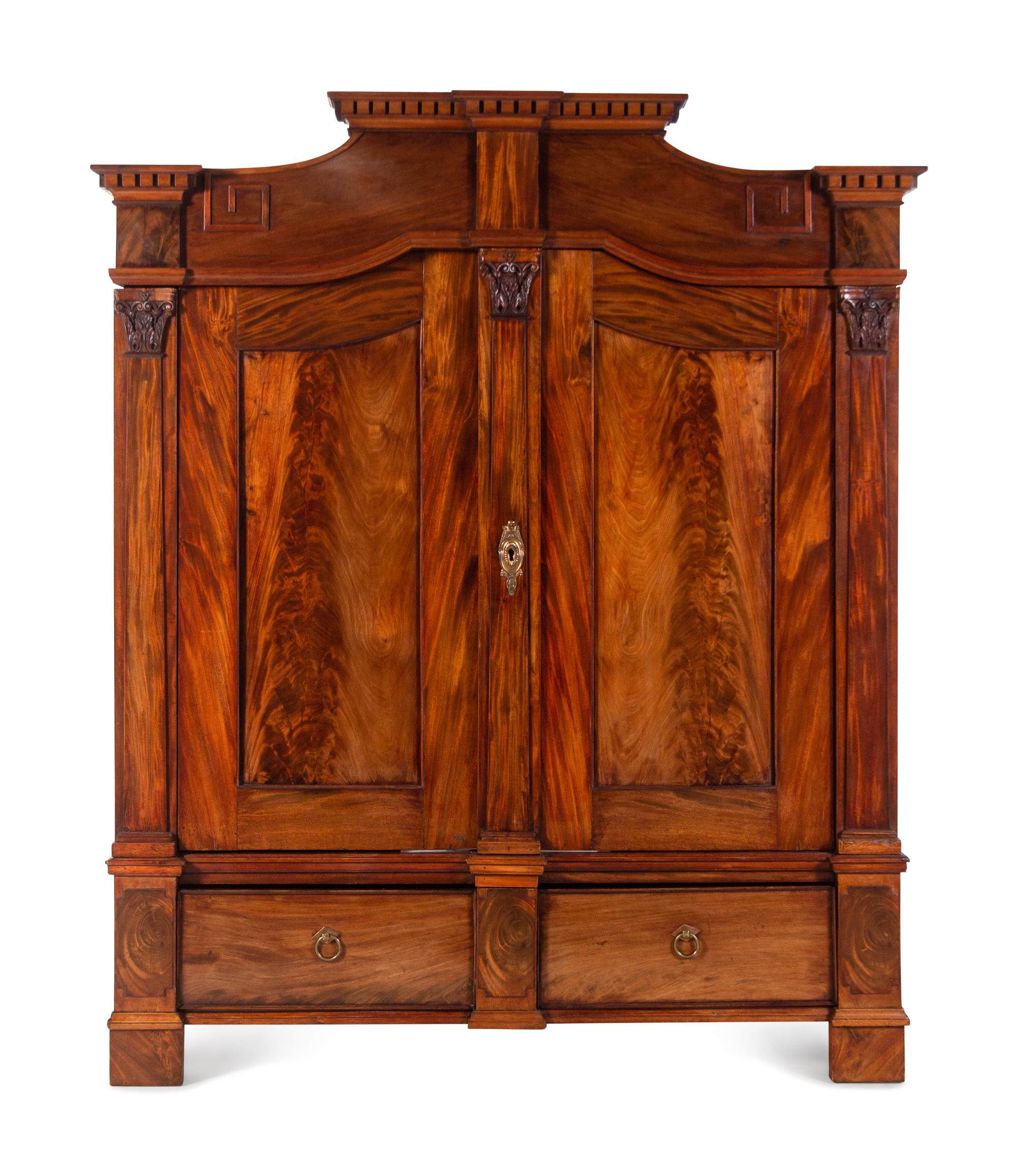 A Continental Mahogany Armoire