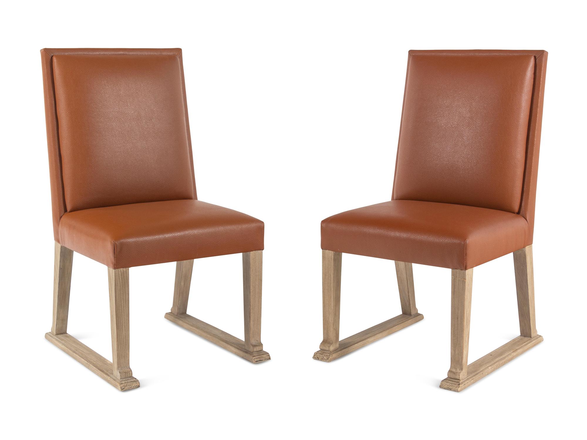 A Pair of Contemporary Faux Leather Upolstered Side Chairs