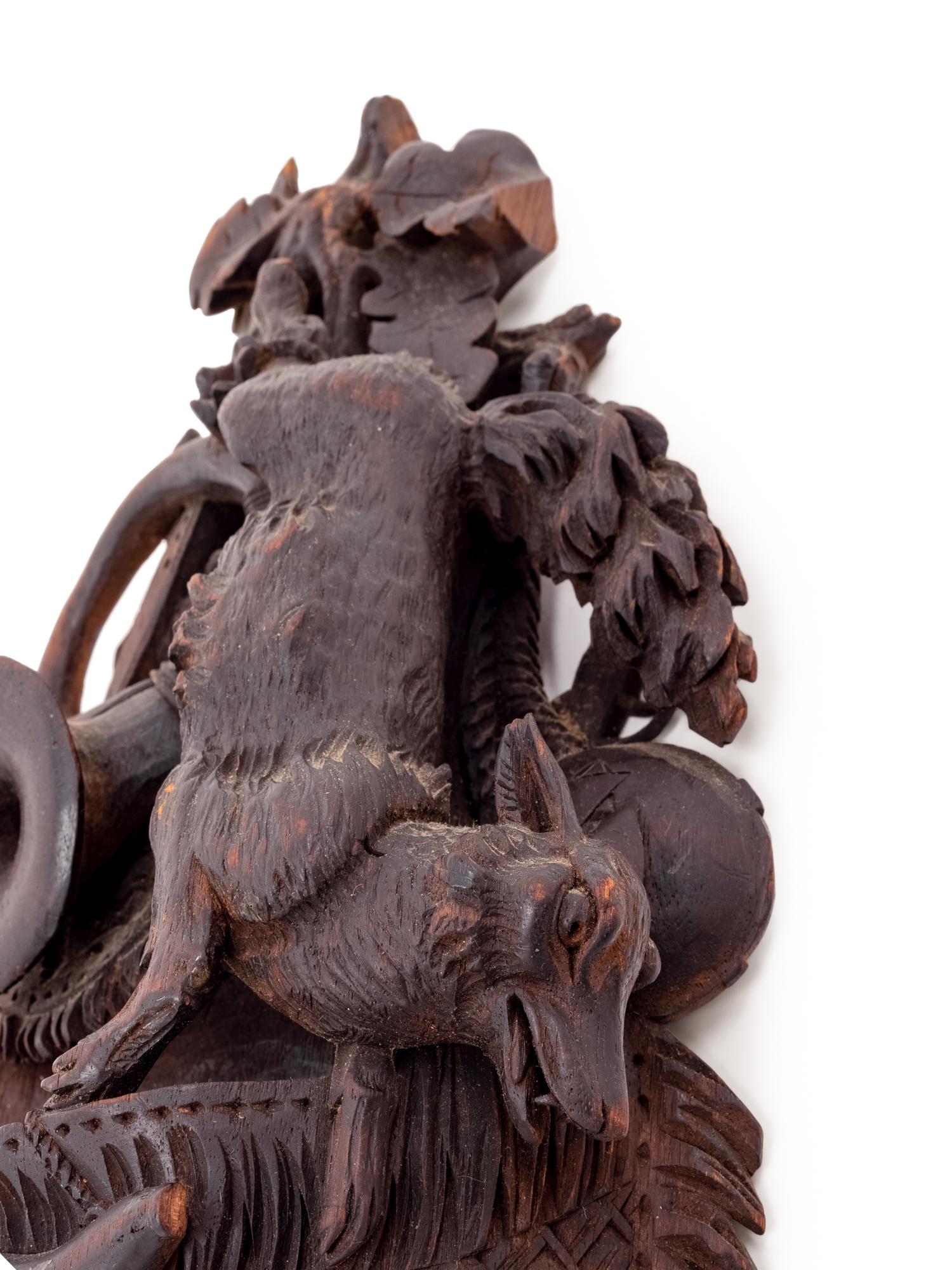 A Black Forest Carved Wall Pocket